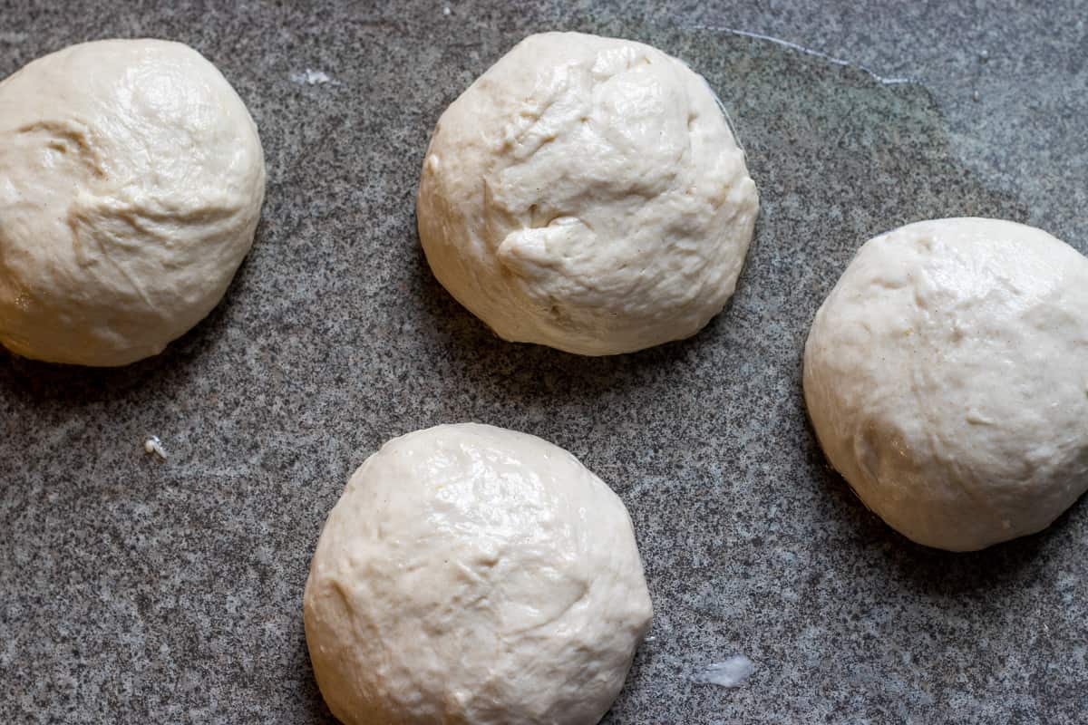 The dough is divided into 4 equal pieces