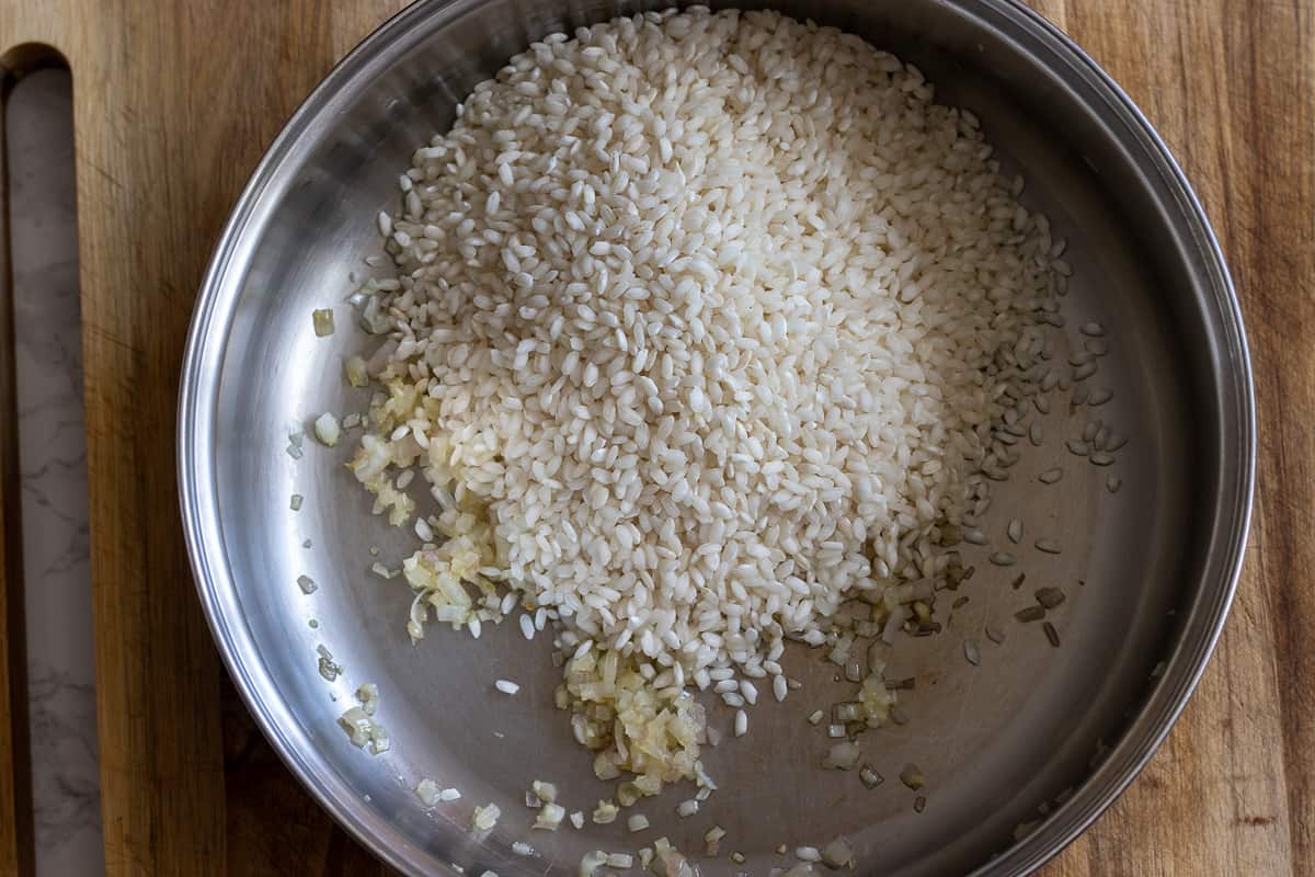 roasting the rice with shallots before adding wine