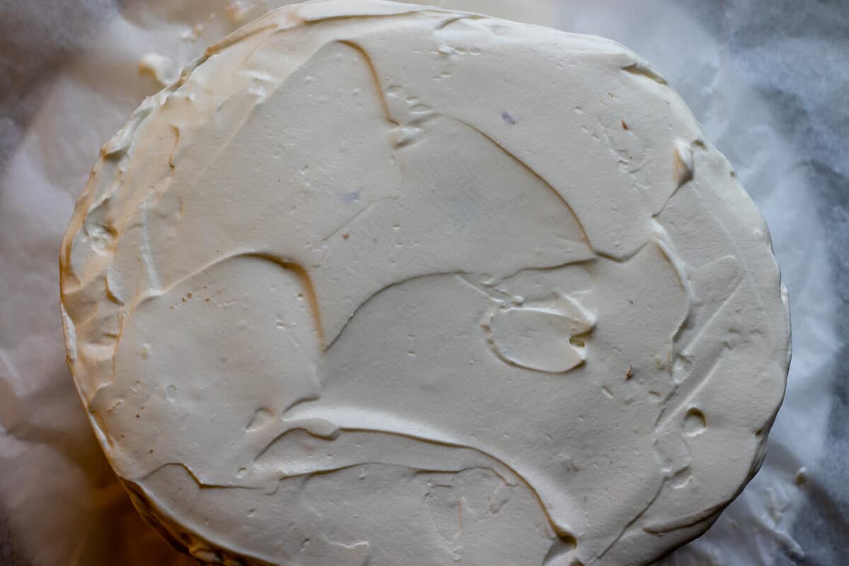 the cake layers are covered with frosting