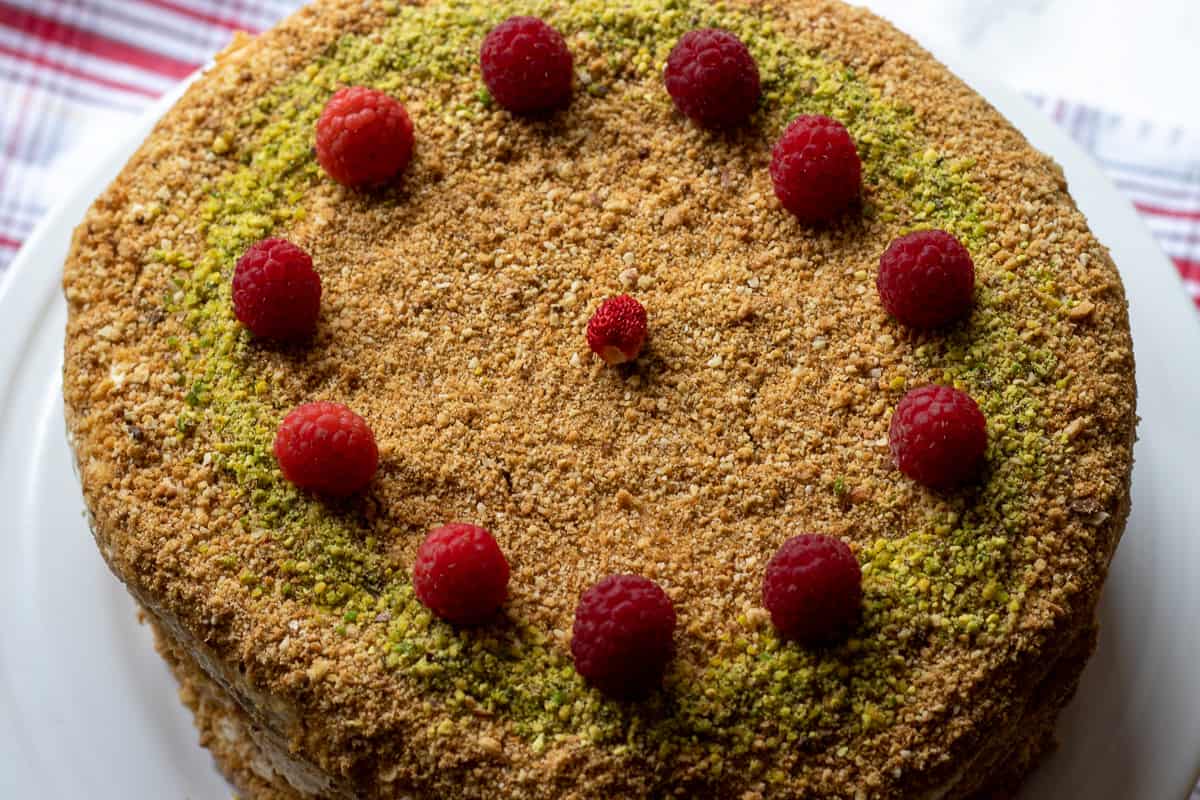 medovik is garnished with rasberries