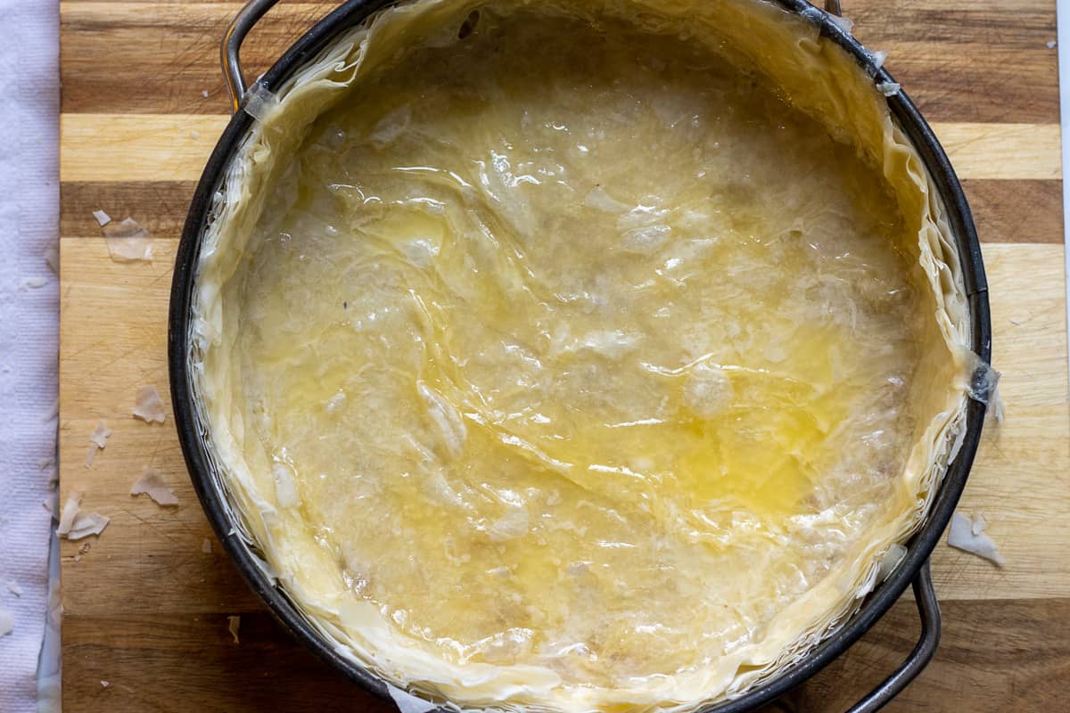 the overhanging filo pastries are trimmed