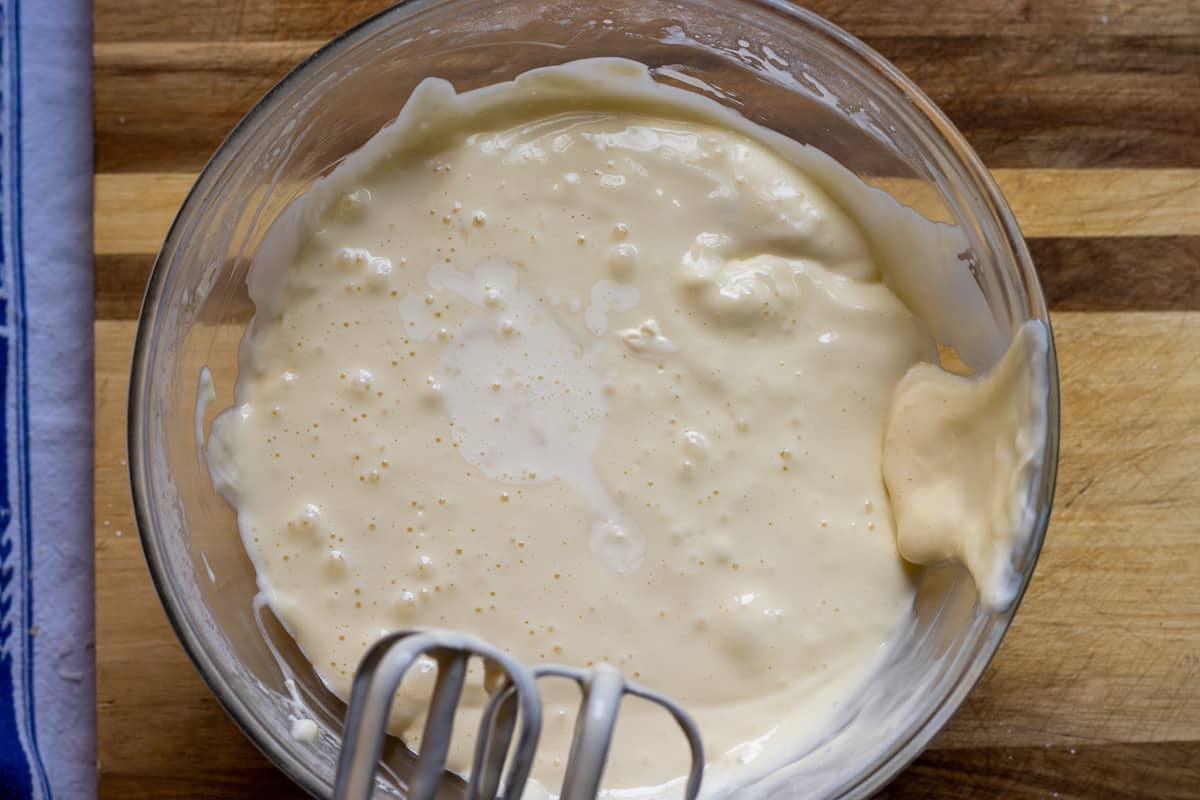 the eggs are beaten into cream cheese mixture