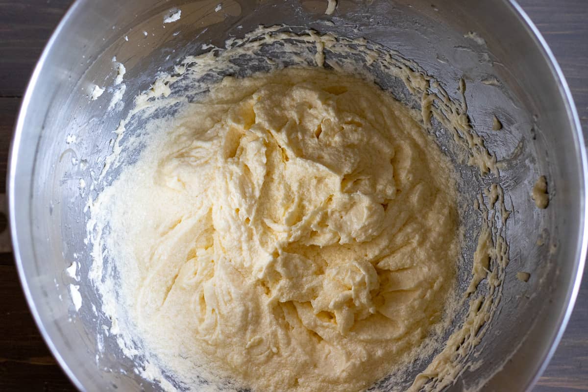 the eggs are added to beaten butter and sugar