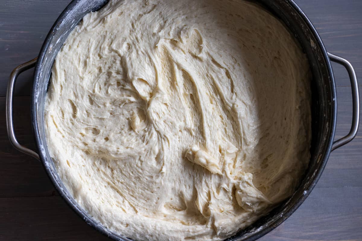 cake batter is poured into the cake tin
