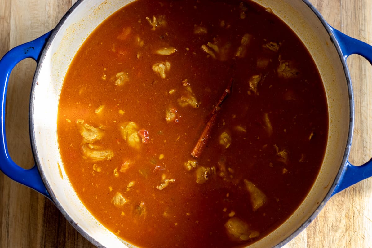 the stock is stirred in the pan