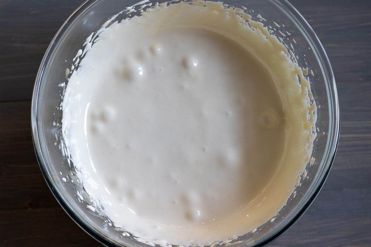 egg yolk and sugar are whisked until pale yellow and fluffy