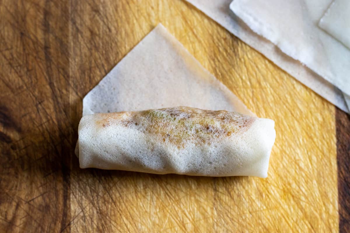 the wrapper is tightly rolled into a cigar shape