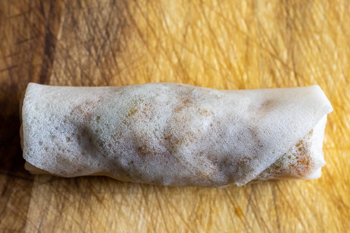 the top edge of the pastry is secured with water and flour paste