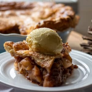 a slice of easy apple pie in a white plate