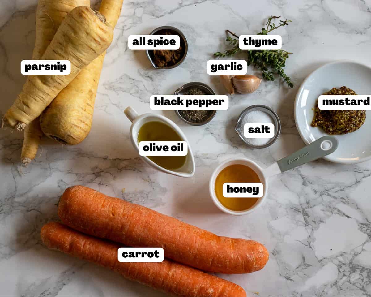 Labelled picture of ingredients for honey roasted carrots and parsnips
