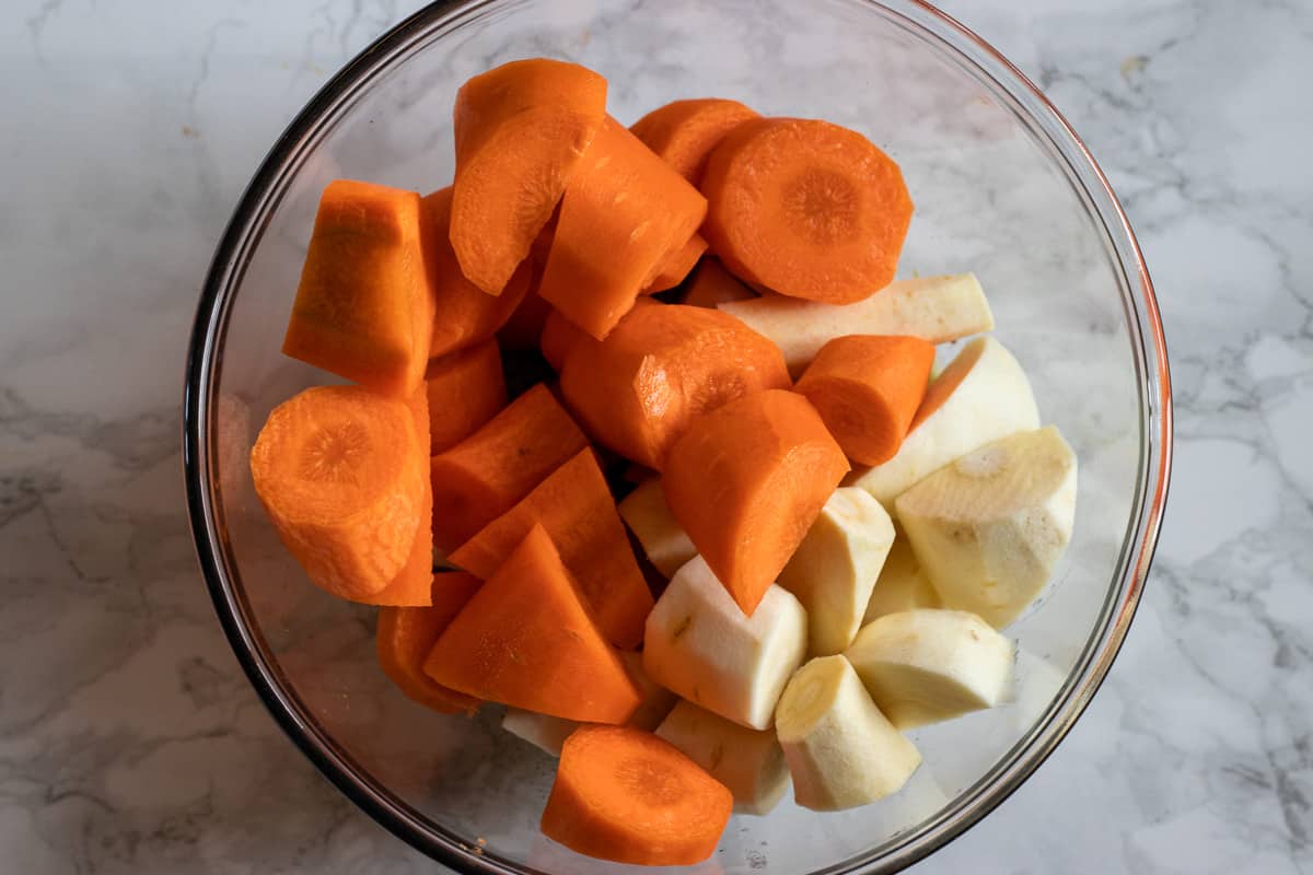 carrots and parsnips are added to the honey glaze