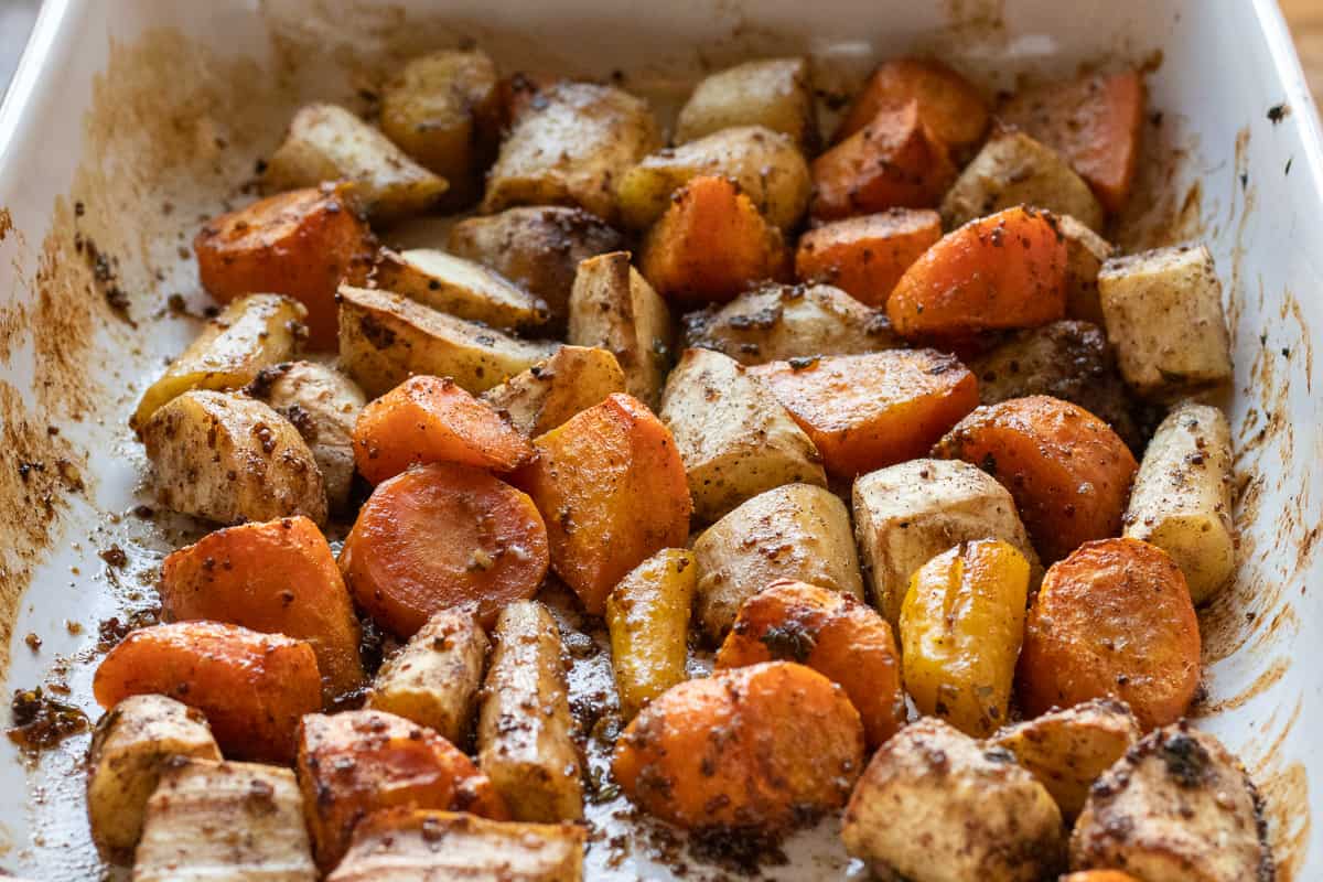 honey roasted carrots and parsnips on a tray