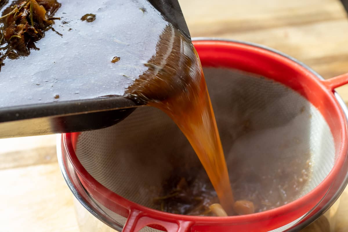 passing the gravy through a sieve