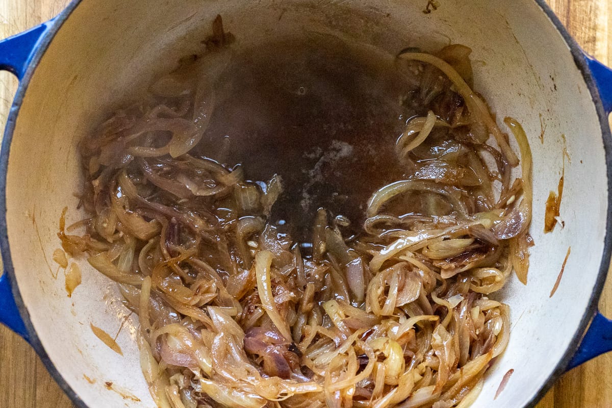 beef stock is added to deglaze the pan