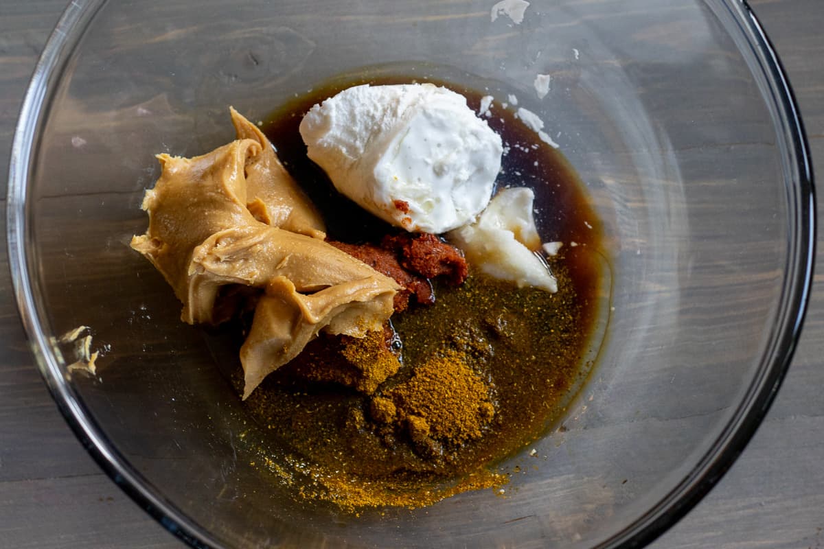 The ingredients for the marinade are placed in a bowl.