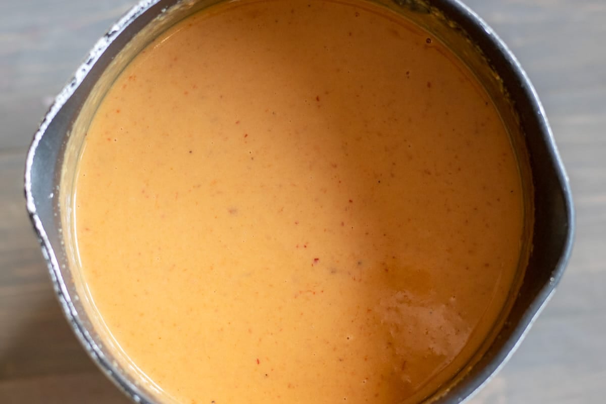 Peanut sauce in a small pot.