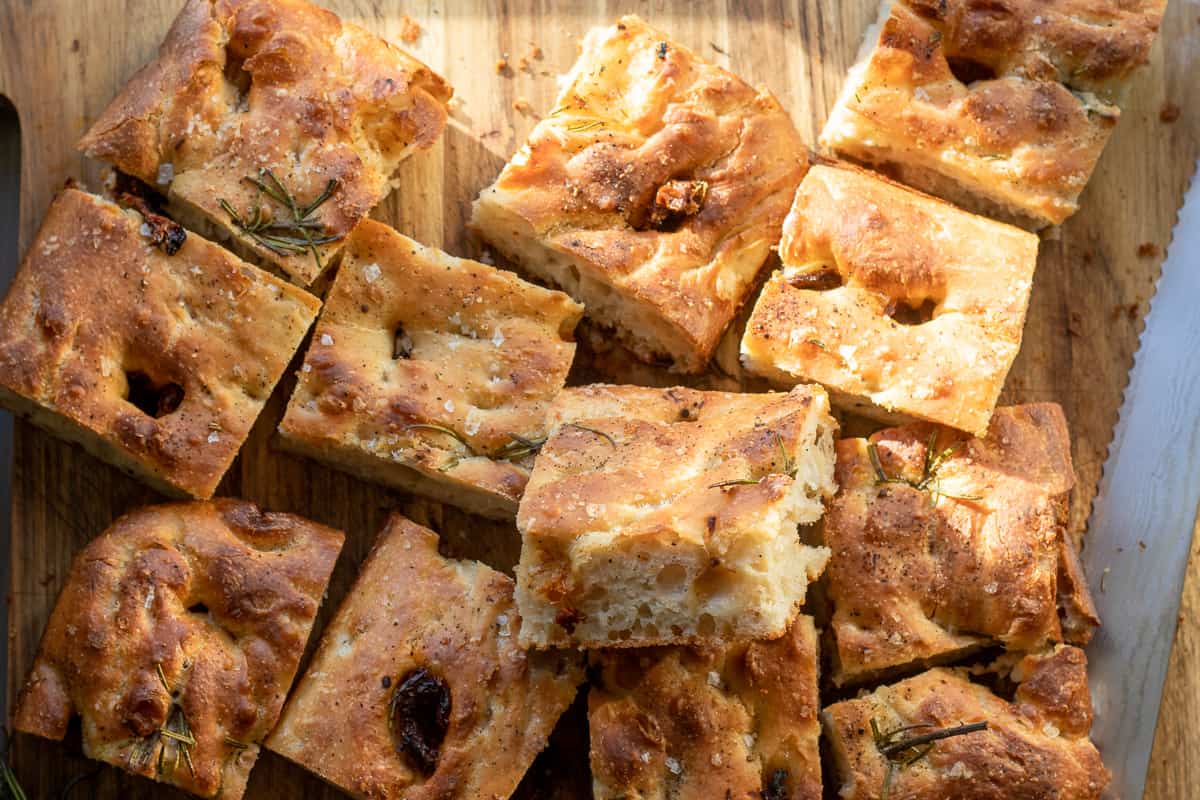 Focaccia bread is cut into 12 squares.