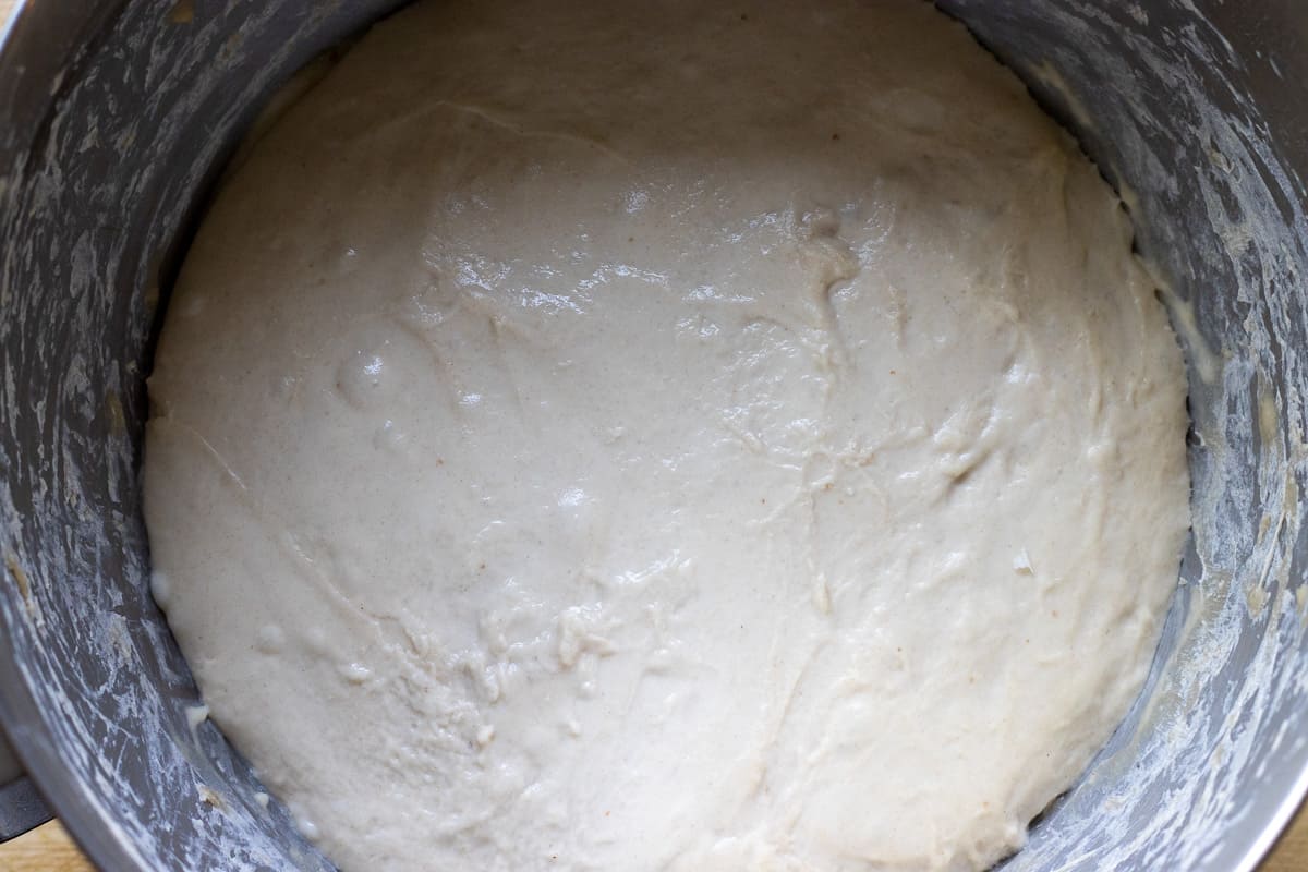 The dough is left to rise in a bowl.