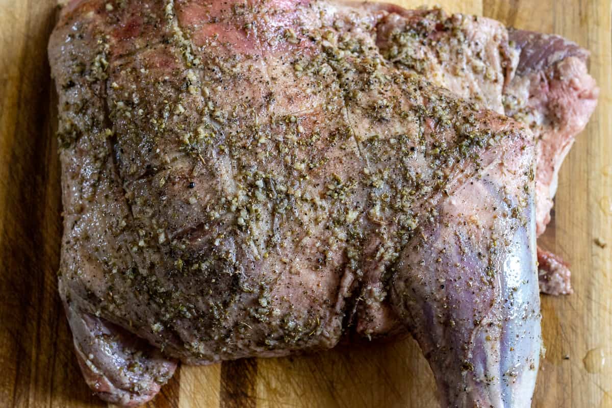 lamb shoulder is rubbed with spiced mixture