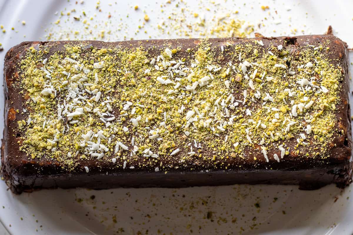 the cake is transferred to a serving plate after freezing for 3 hours