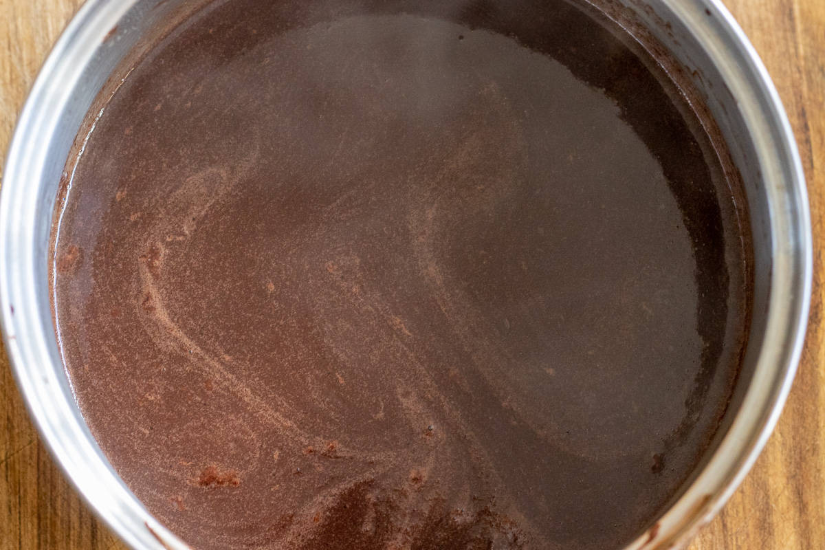 Chocolate pieces are melted and incorporated with milk mixture