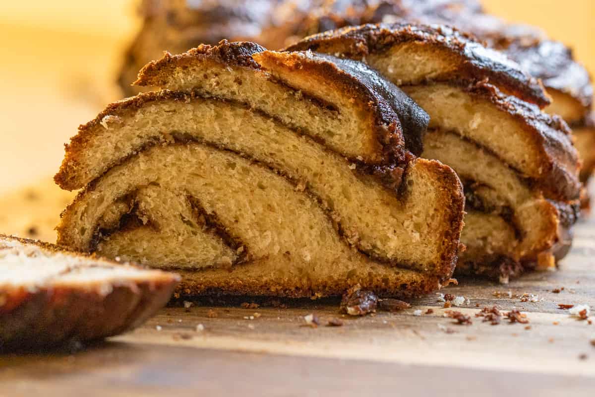 freshly baked Nutella babka is sliced for serving
