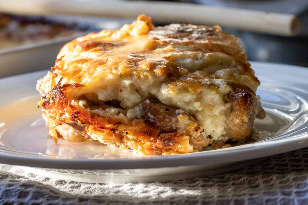 a slice of elbasan tava served on a plate