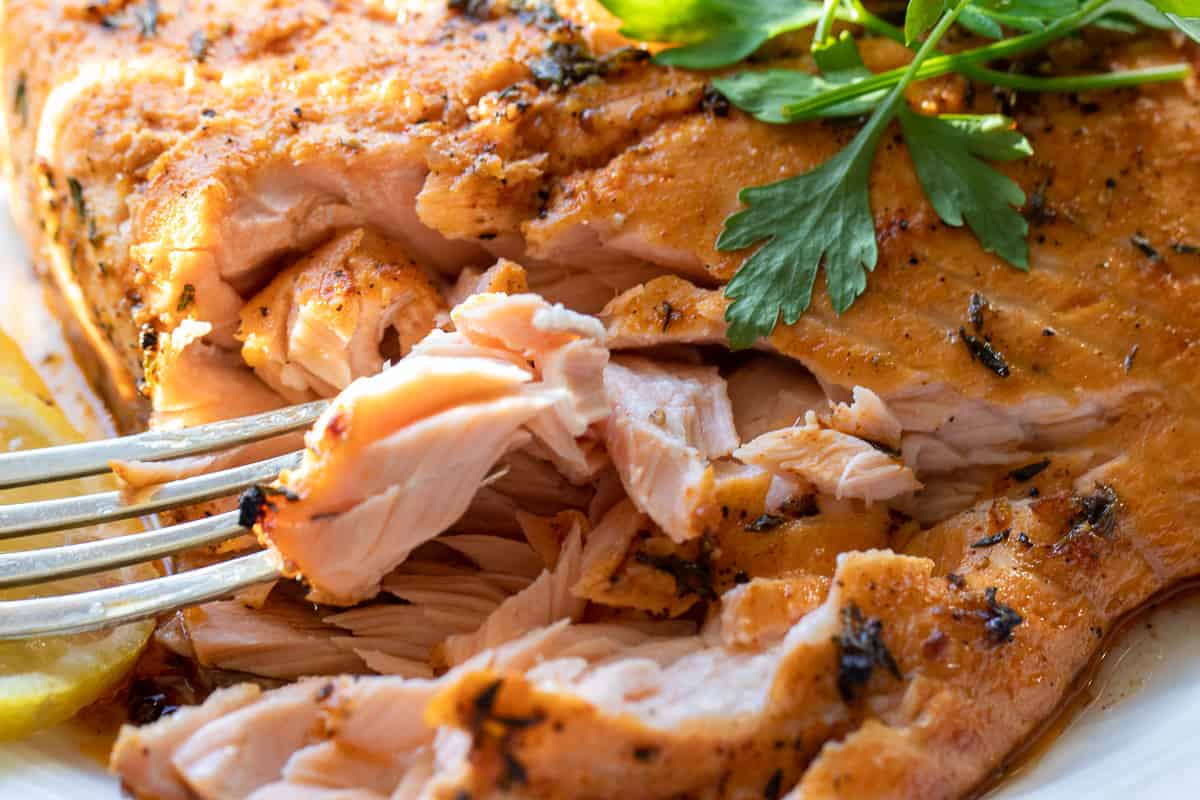 baked salmon can be easily flaked with a fork