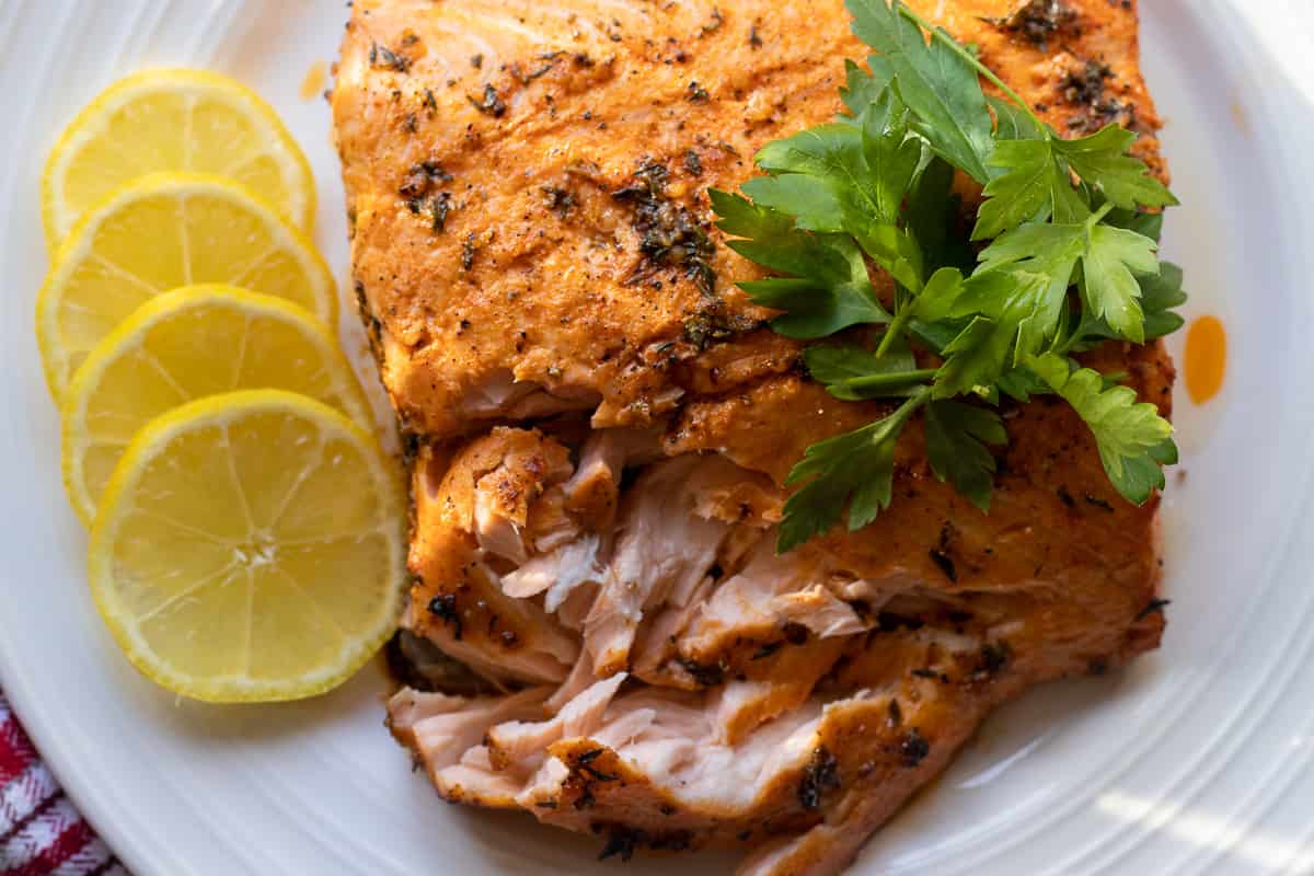 salmon fillet is cooked until it is flaky