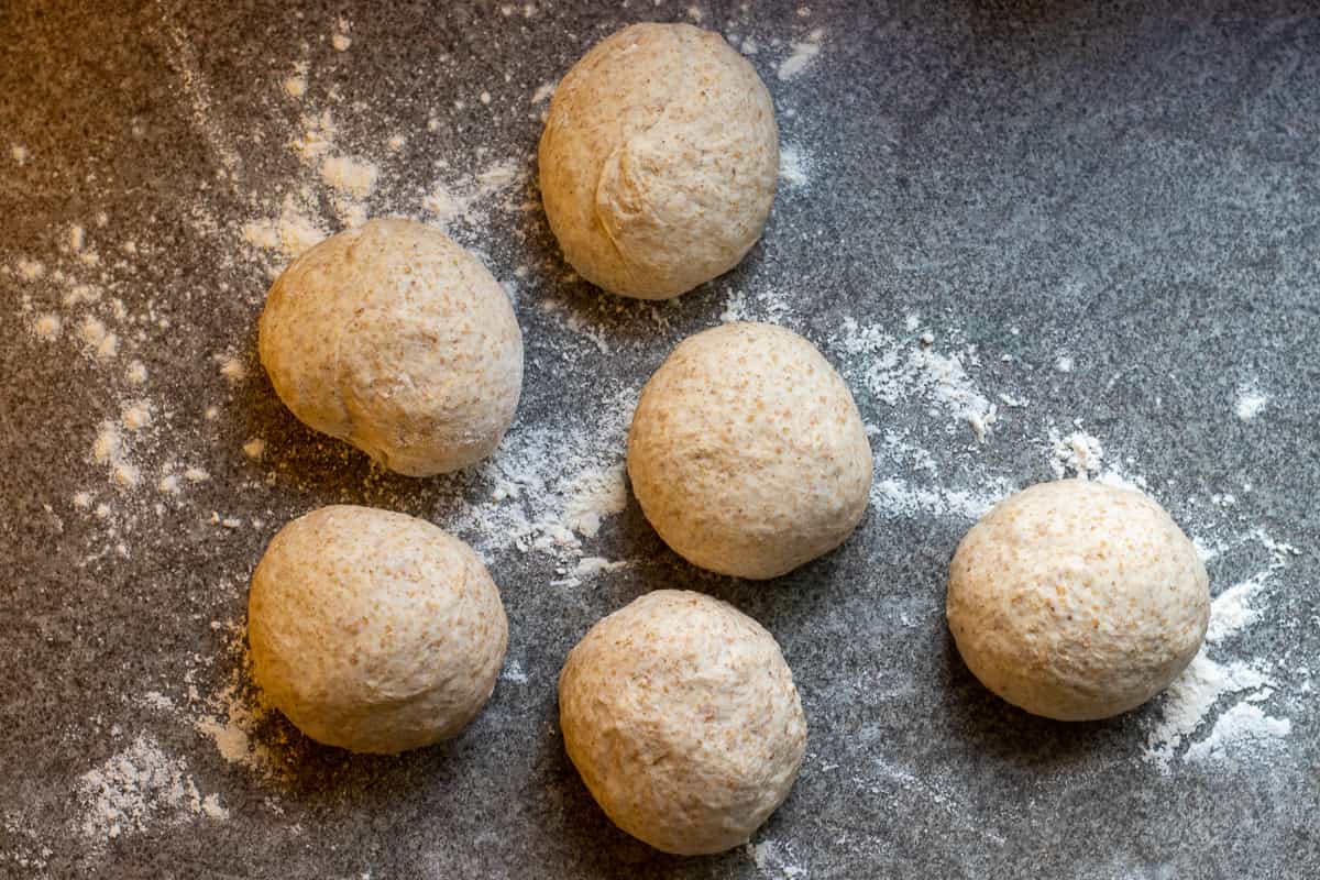 the dough is divided into 6 equal balls