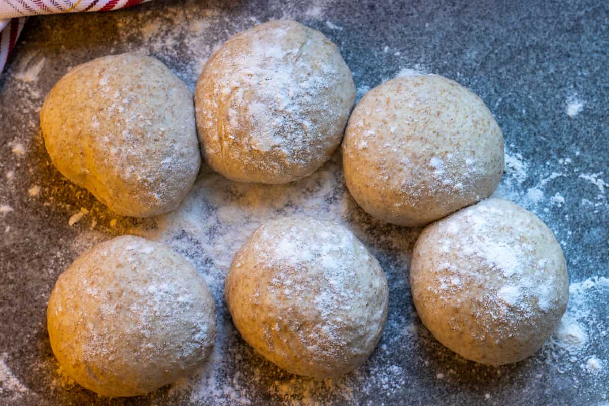 6 dough balls are rested for 15 minutes before shaping