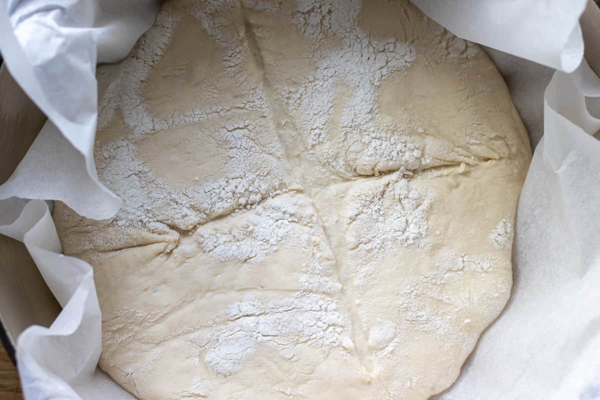 the dough has been transferred in a dutch oven