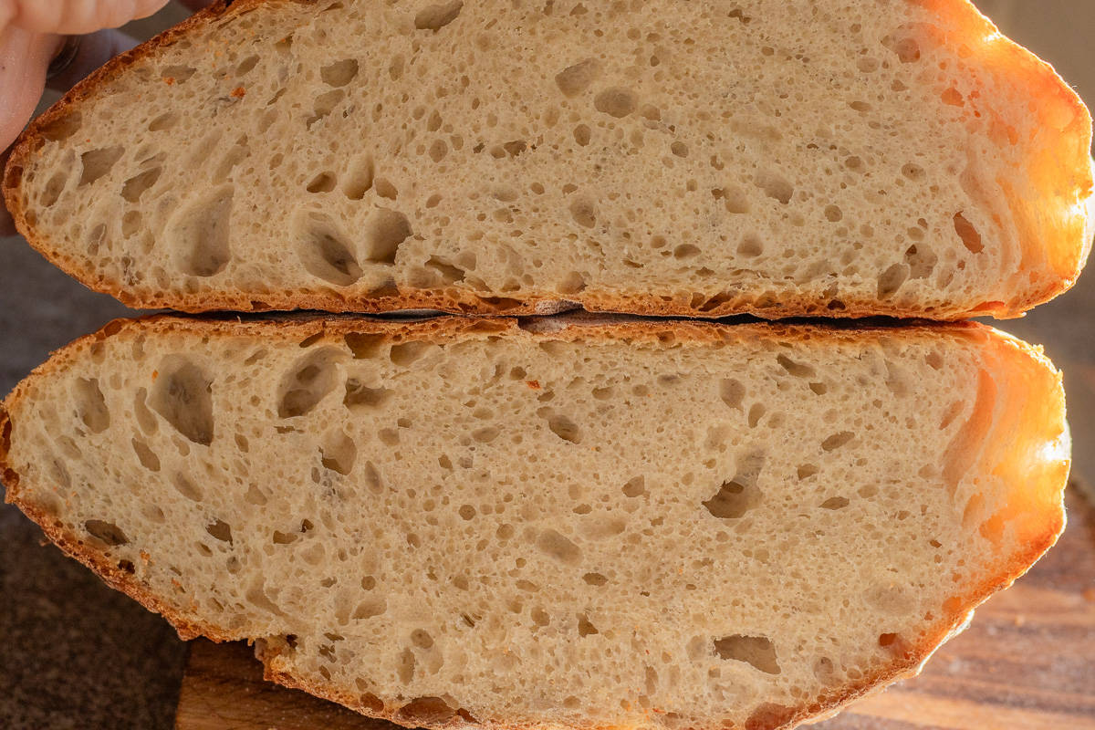 dutch oven sourdough bread cut in half