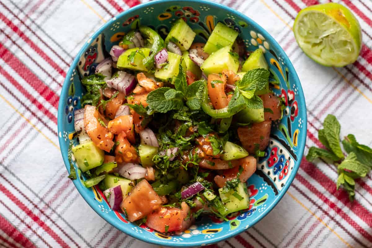 Shirazi Salad is tossed with the dressing