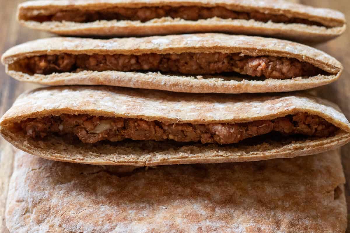 the pitas are filled with meat filling