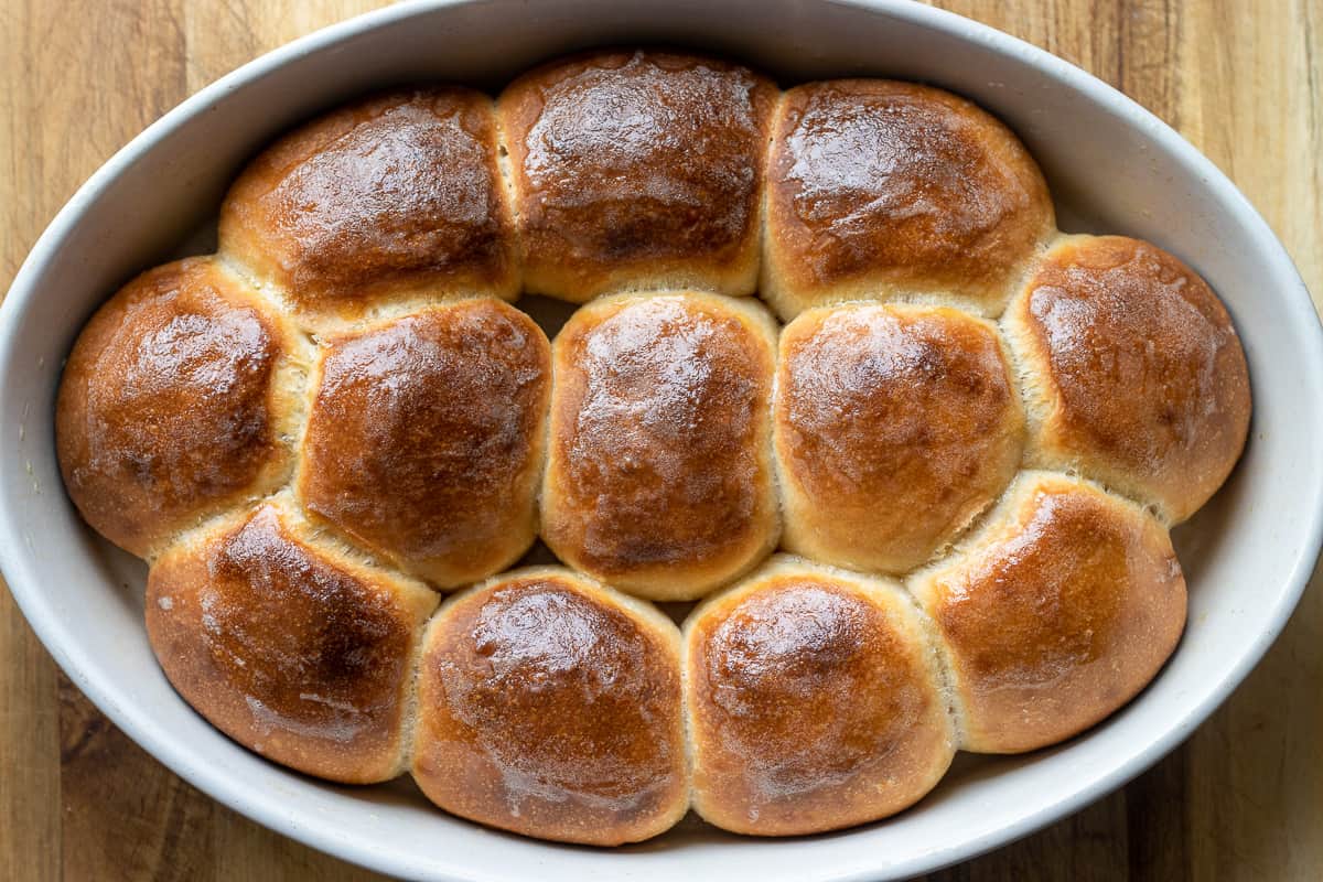 Dinner rolls are baked until golden brown.