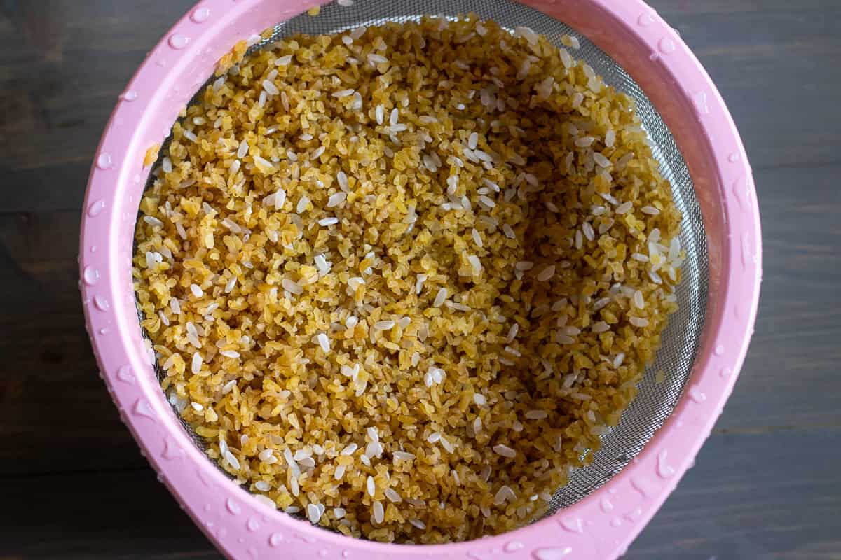 bulgur and rice are rinsed with cold running water