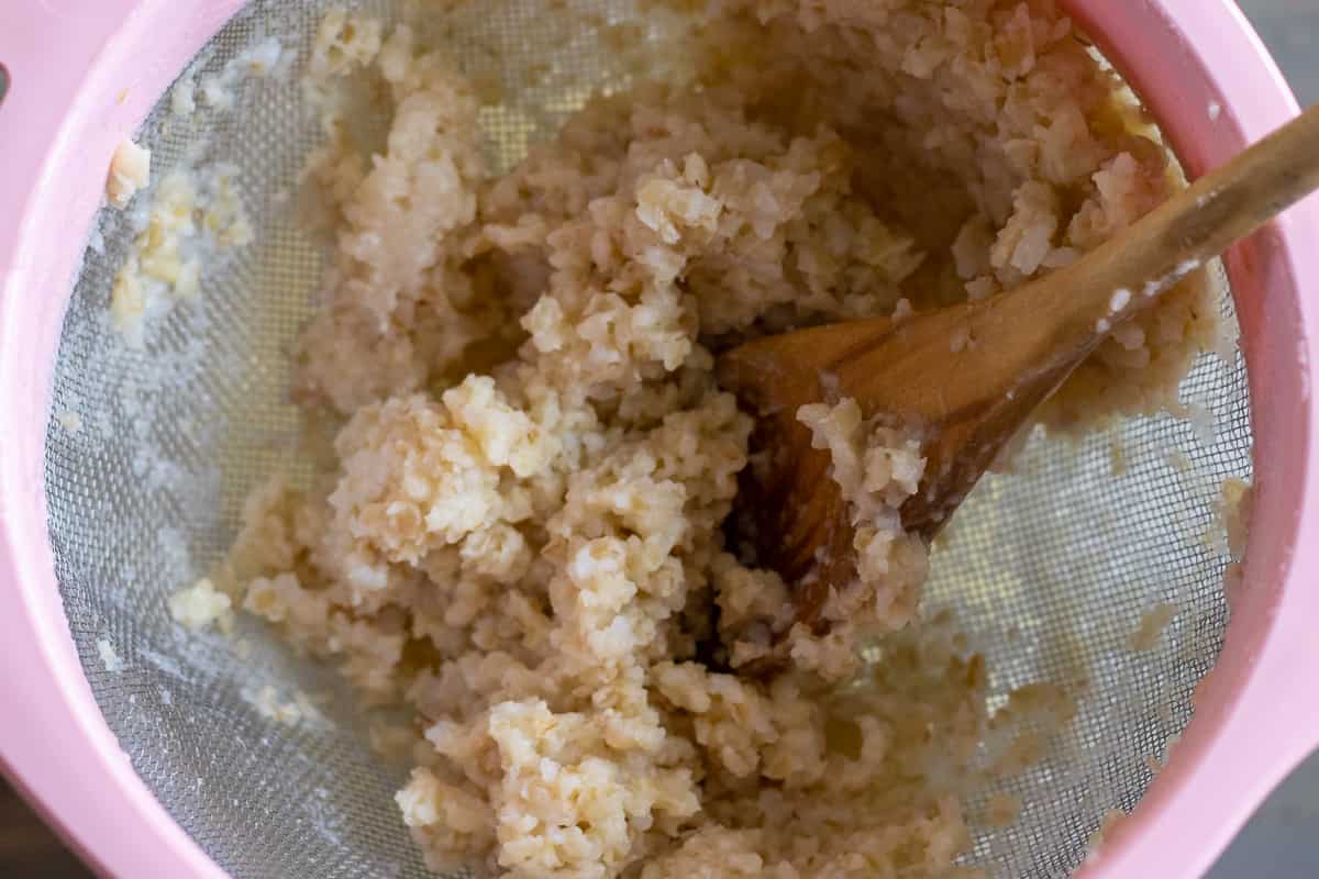 passing cooked bulgur and rice through a sieve