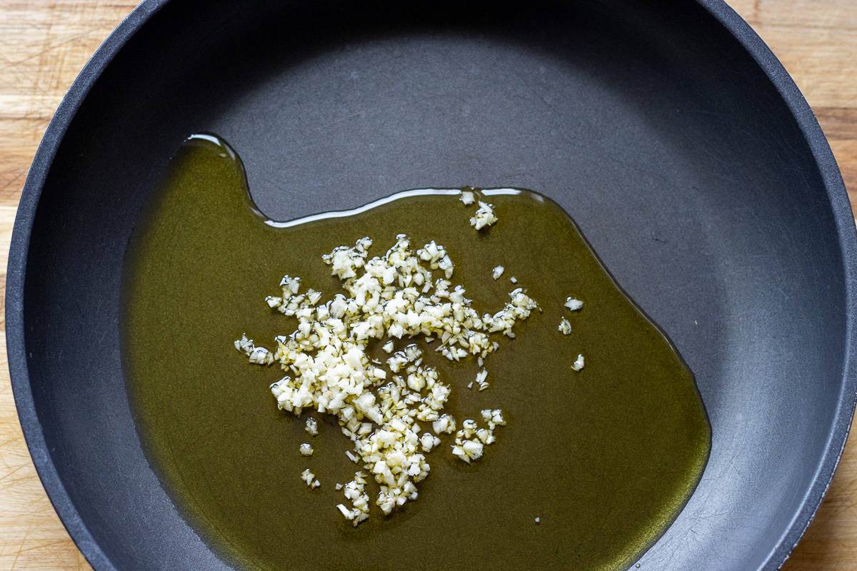 gently sautéing the garlic with olive oil