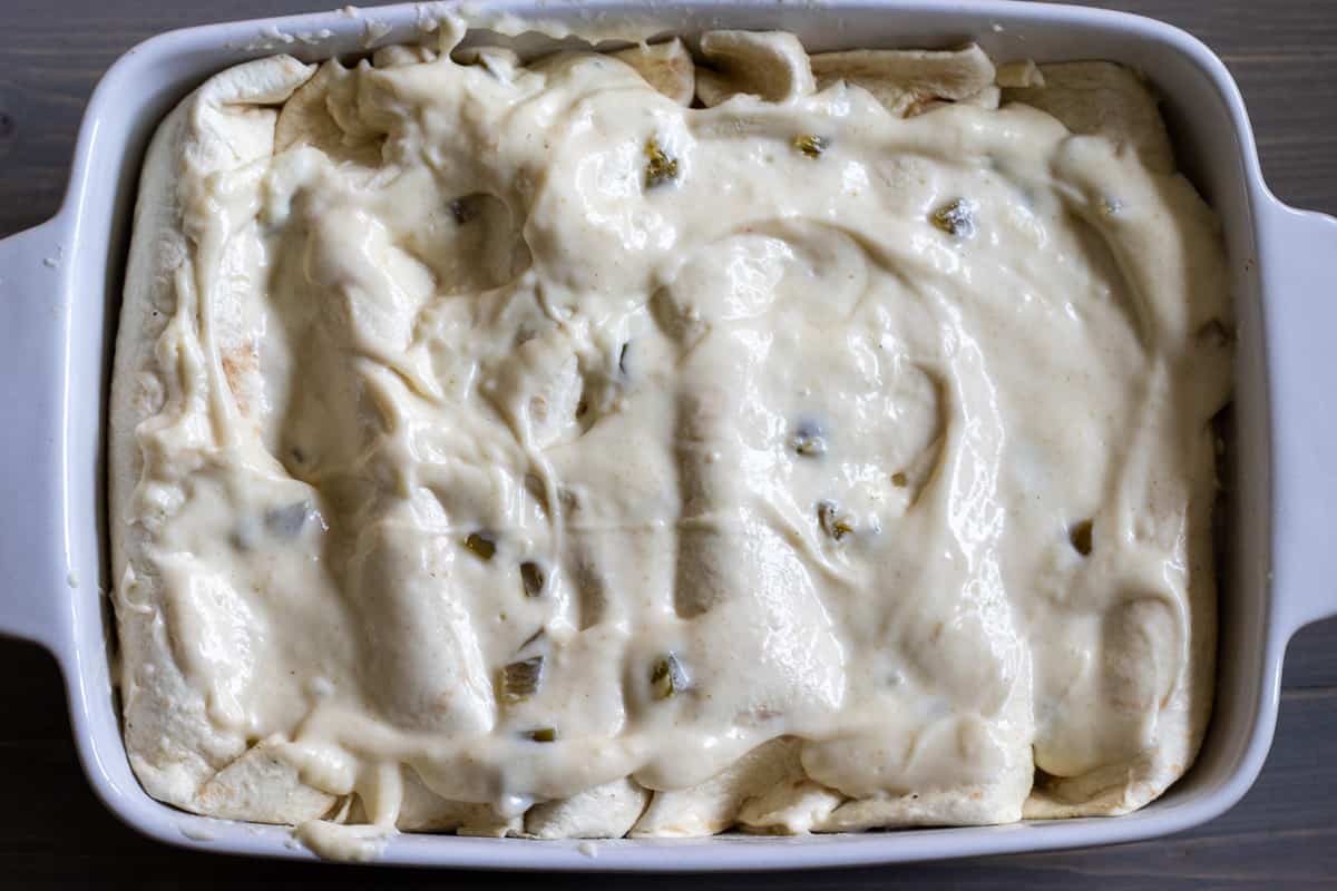 tortila wraps are covered with white sauce