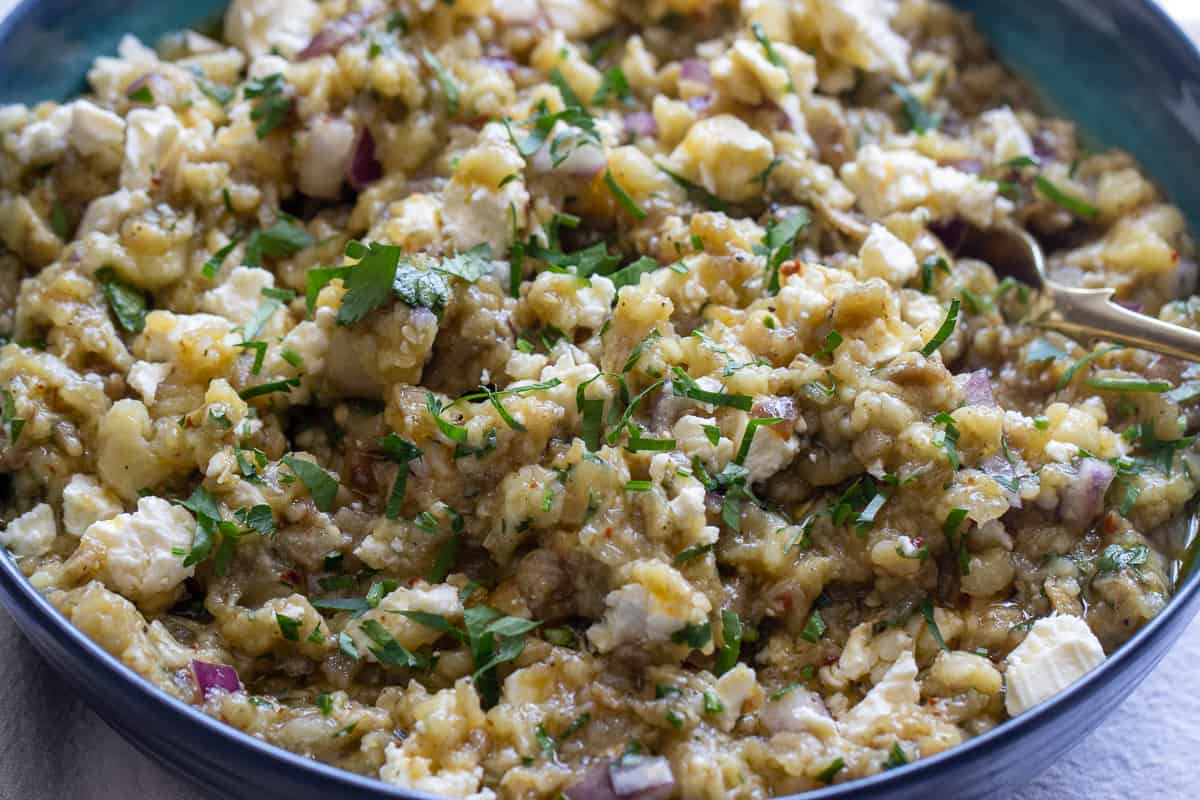 the crumbled feta is incorporated to the Melitzanosalata (roasted Greek eggplant dip)
