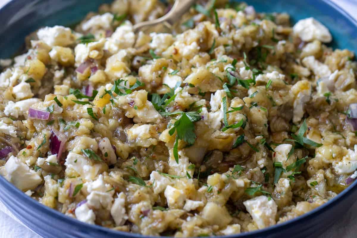 melitzanosalata, smoky roasted Greek eggplant dip garnished with crumbled feta