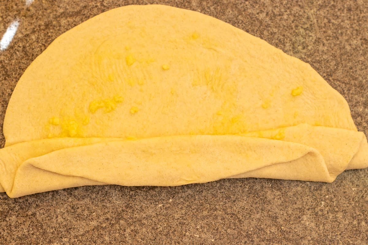 plying the dough circle like an accordion