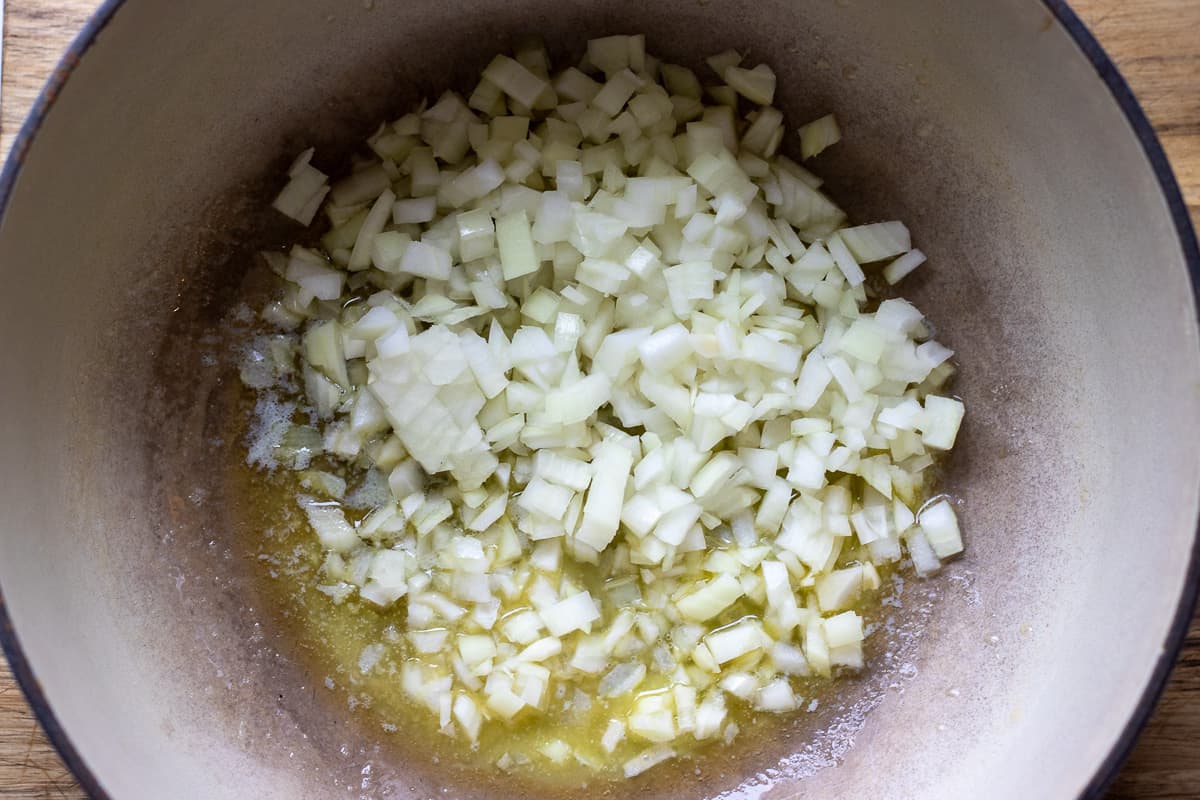 diced onions are added to melted butter