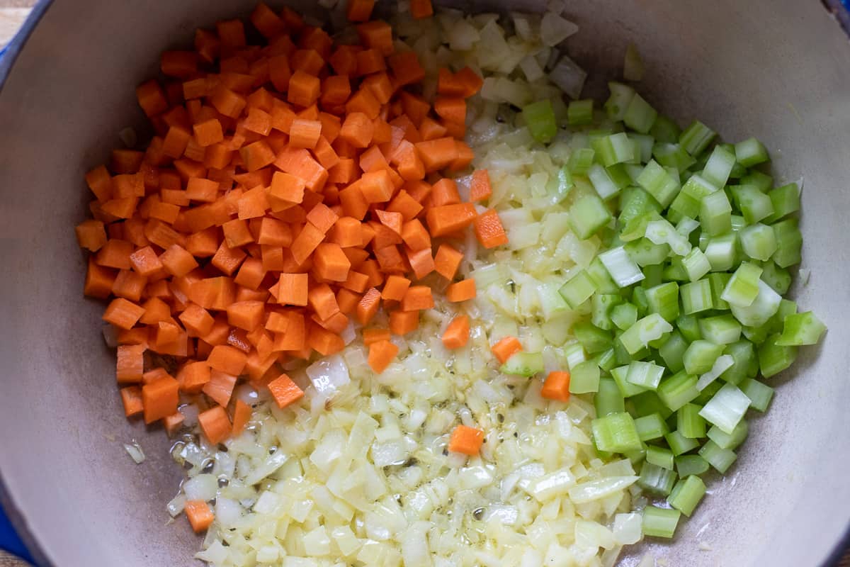 diced carrots and celery are added to sautéed onions