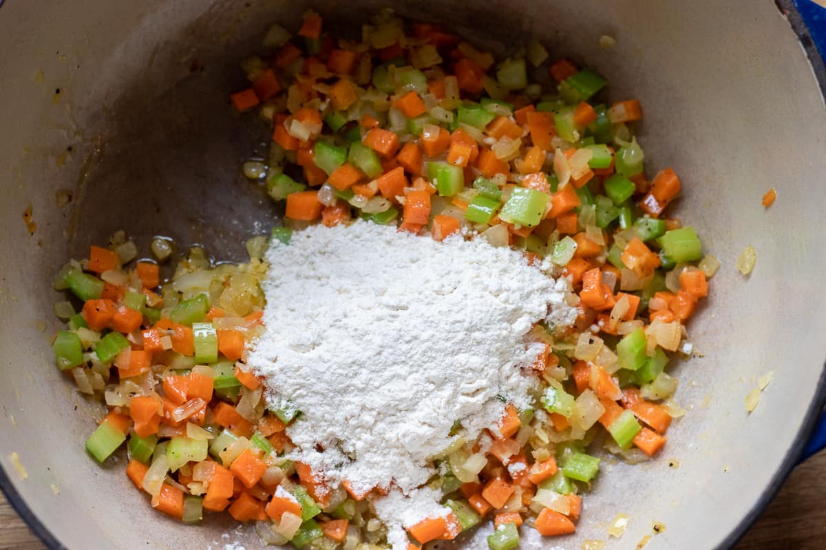 the flour is added to the sautéed vegetables
