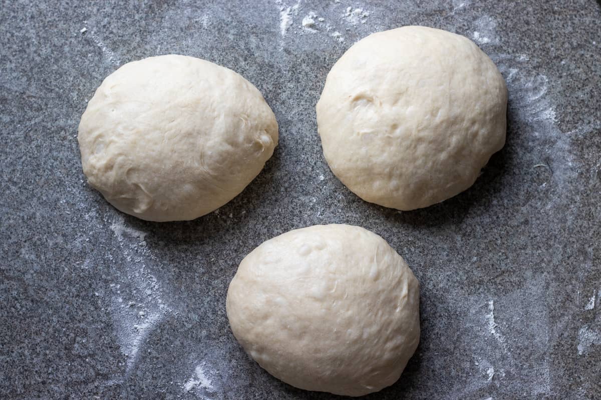 milk bread dough is divided into 3 equal pieces