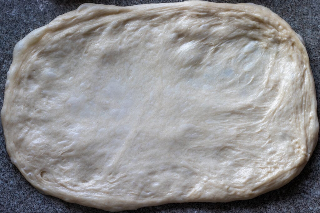 a dough ball is shaped into rectangular