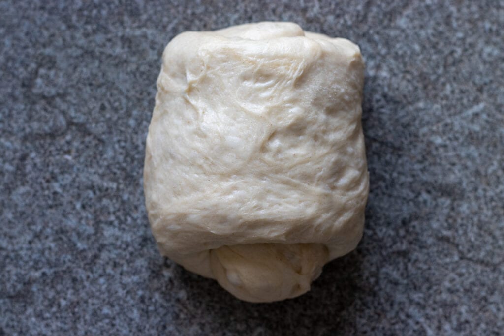 dough rectangular is rolled into a log