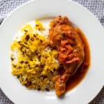 barberry rice with chicken served in a sauce